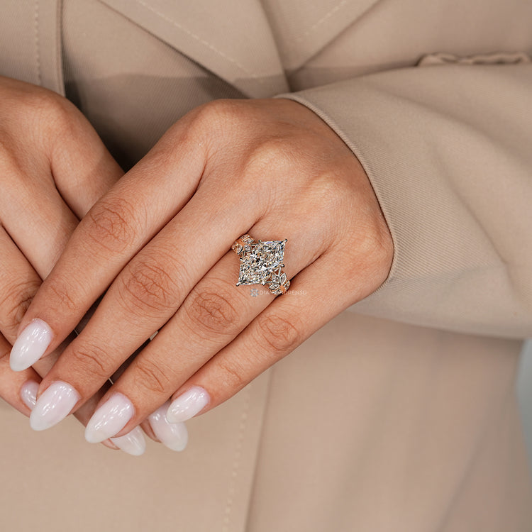 Lab grown Dutch marquise diamond ring with side stones.