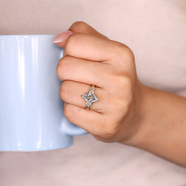 Nature inspired marquise ring with seven stone style.