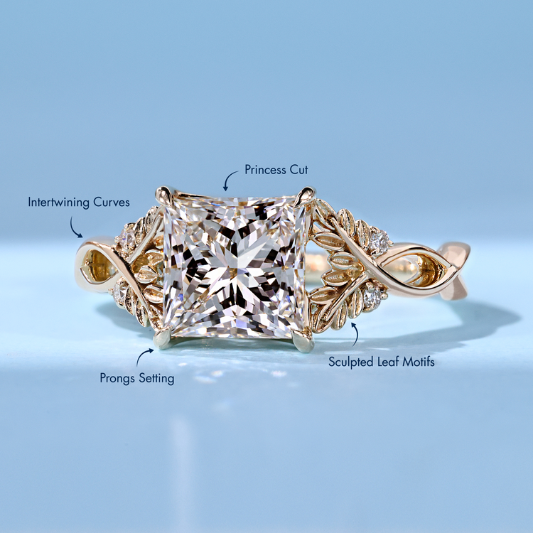 Handmade princess cut ring with four claw prongs.