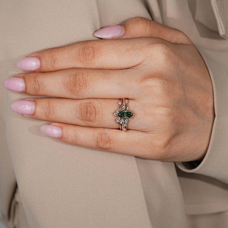 Nature inspired bridal set with green marquise diamond.