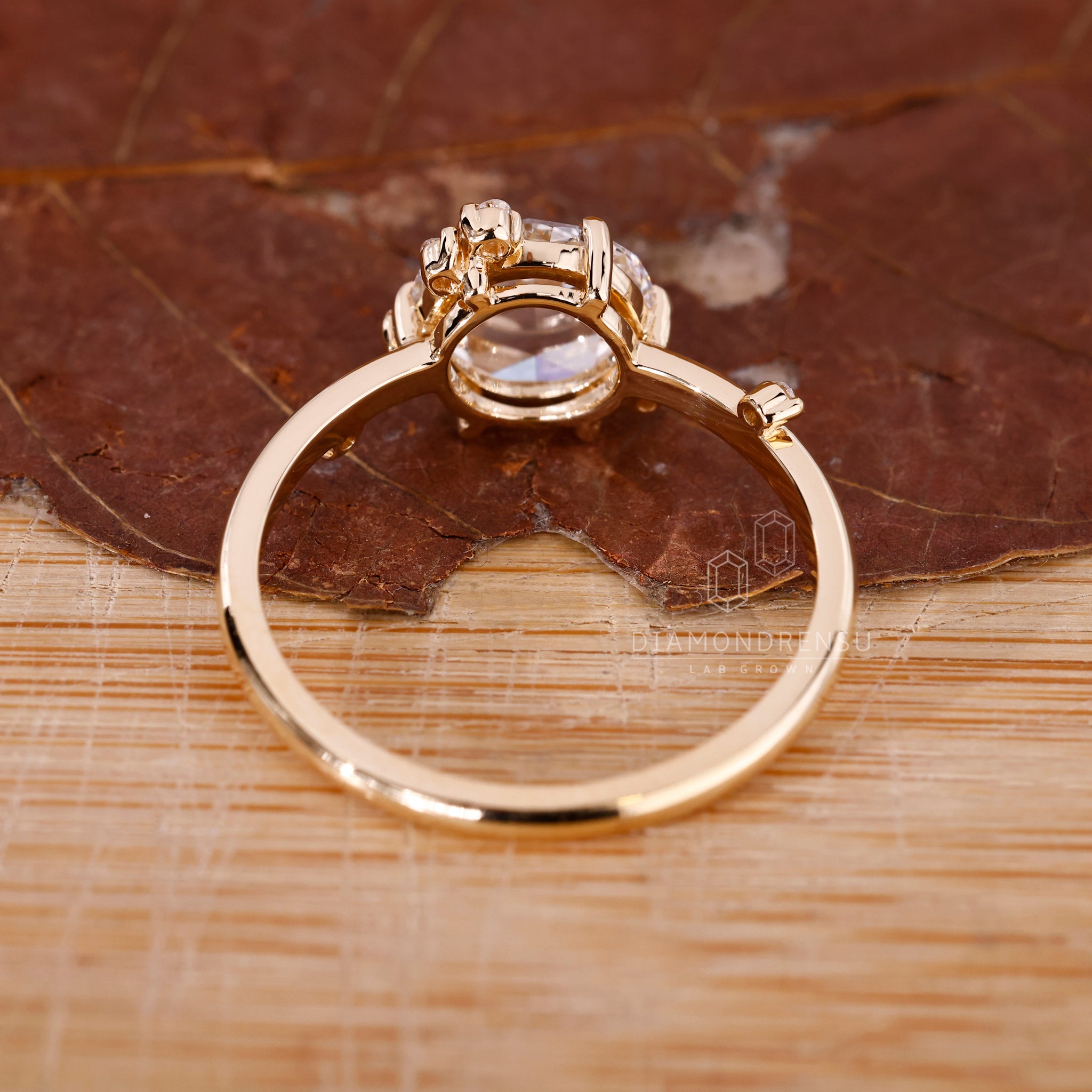 Yellow gold handmade engagement ring with cluster diamonds.