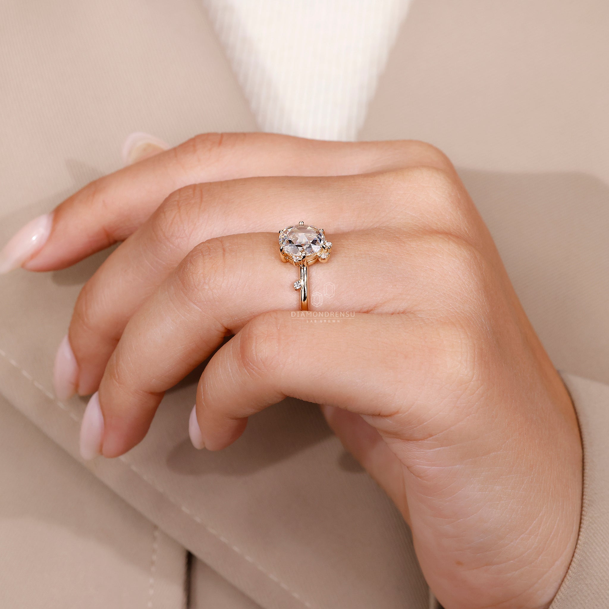 Round and rose cut diamond ring with 6 prongs.