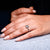 Oval old European cut diamond ring with four claw prong setting