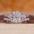 Cushion cut ring with wedding band in a custom white gold bridal set.
