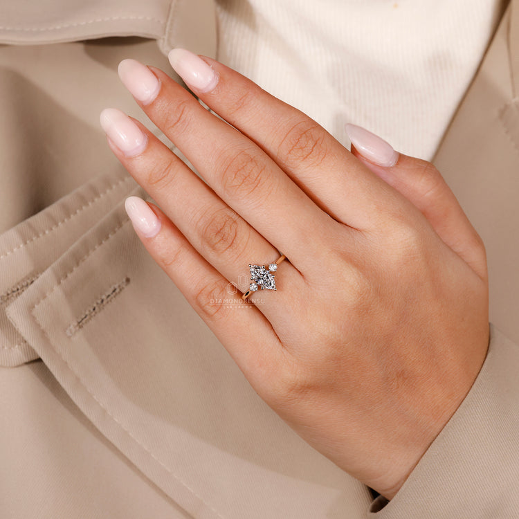 UK engagement ring with marquise and round diamonds