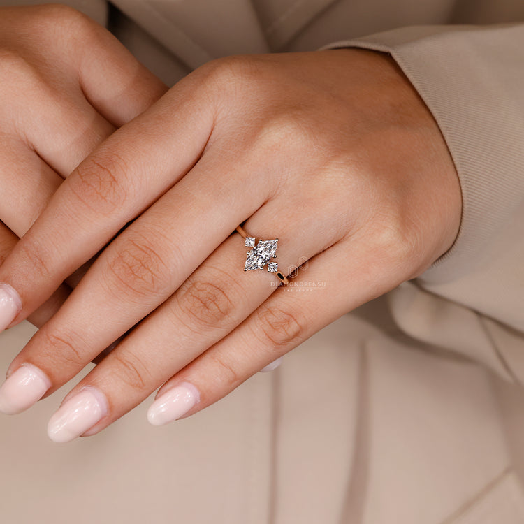 Lab grown marquise diamond ring with two side stones