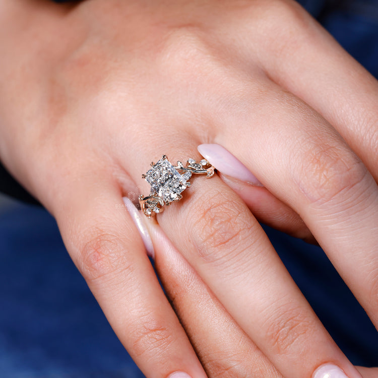 Yellow gold cluster setting ring with radiant center stone