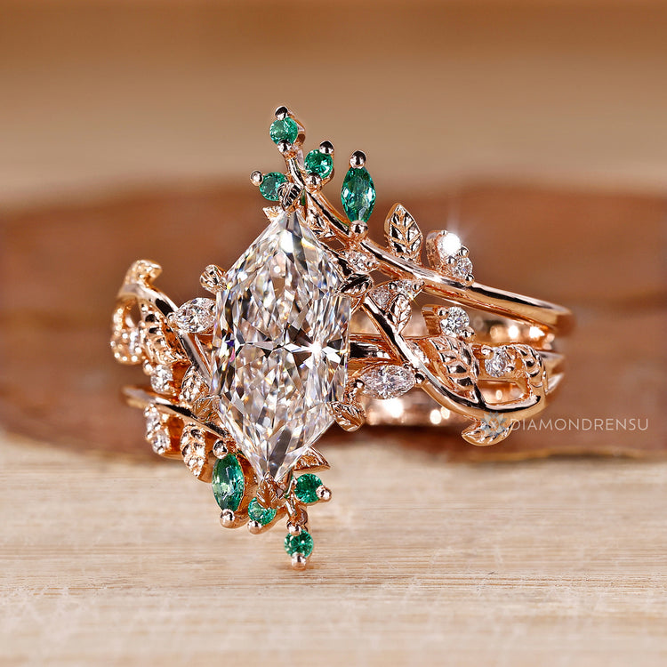 Enhancer band with marquise and round side stones.