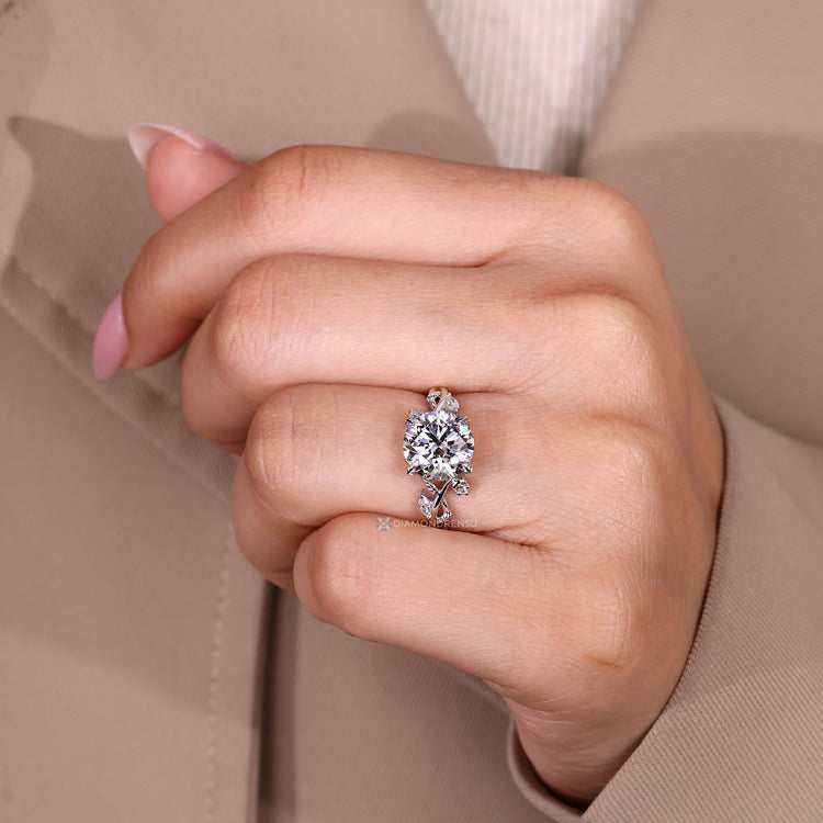 IGI certified round cut diamond ring with side stones.