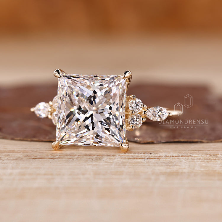 Lab grown diamond ring with four claw prong setting.