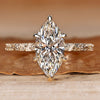 Solitaire engagement ring with marquise cut diamond.