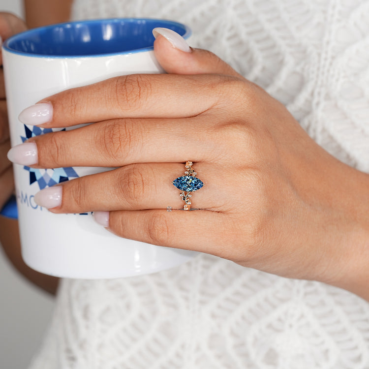 Handmade marquise ring with hidden blue sapphire