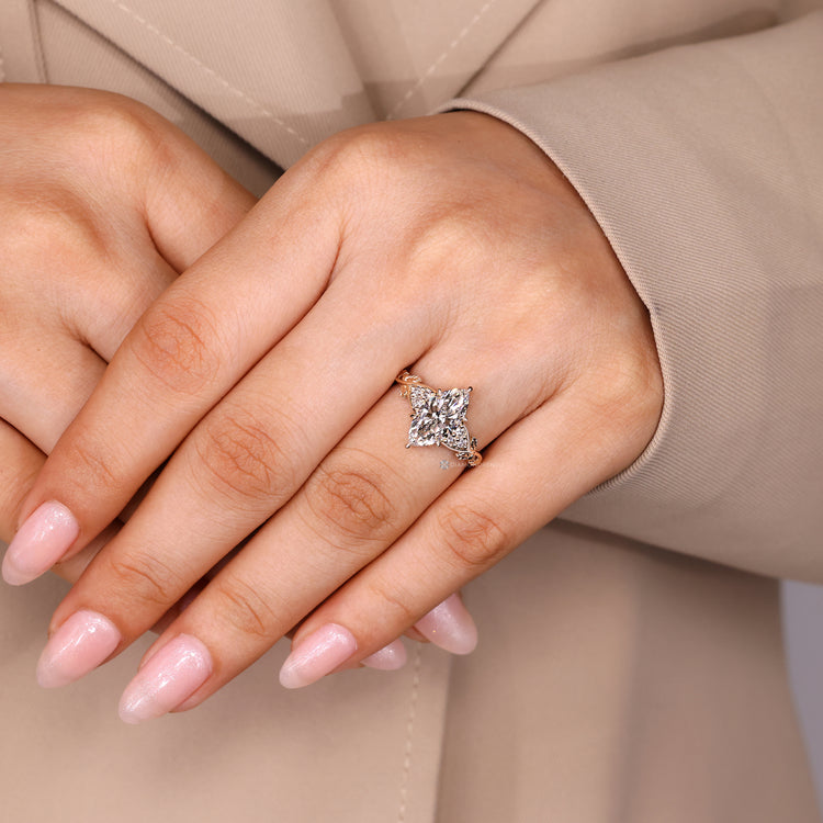 Marquise ring with six claw prong setting design.