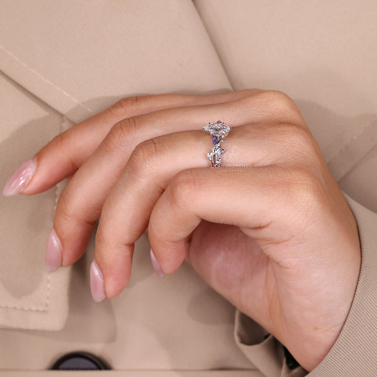 Lab grown diamond ring with leaf style prong setting.