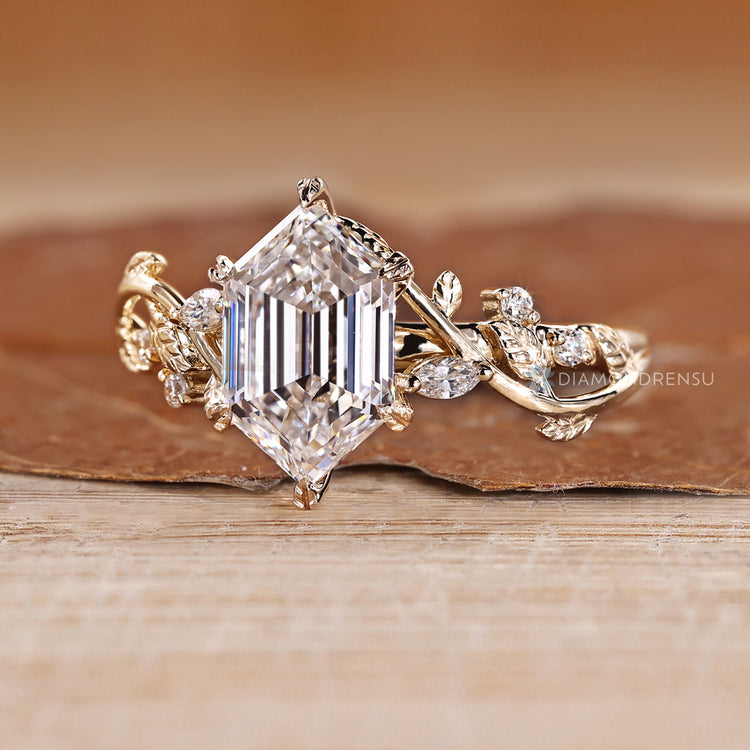Hexagon diamond ring with round and marquise stones.