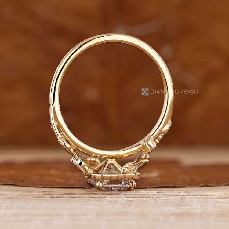 Lab grown radiant diamond ring with four claw setting.