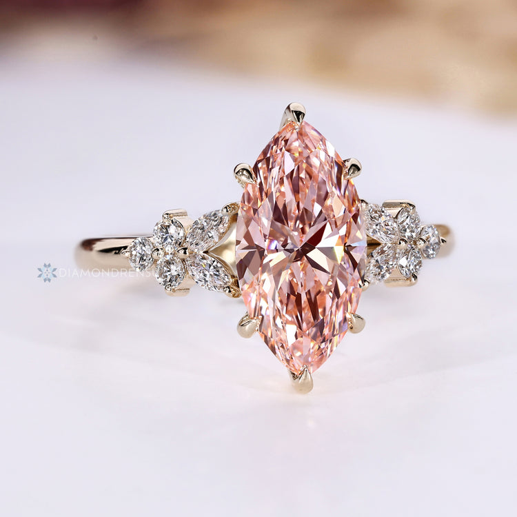 Marquise cut ring with six claw prong setting.