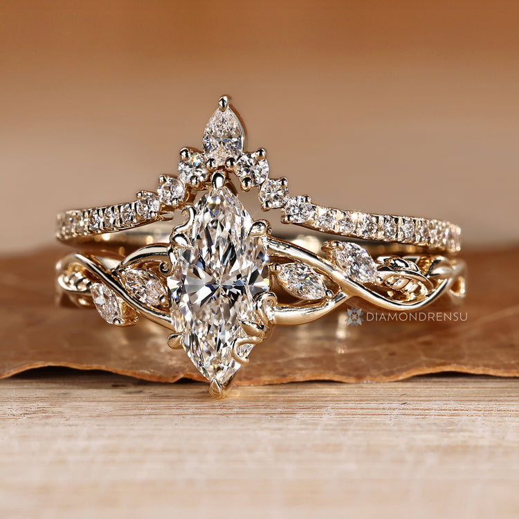 Marquise diamond ring with marquise side stones.