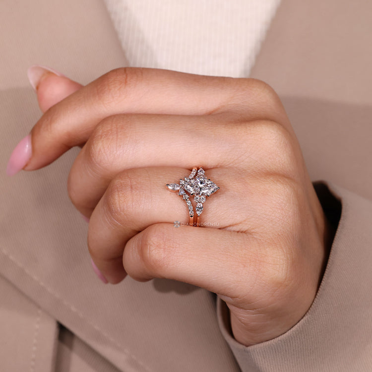 Marquise wedding ring with stackable band design.