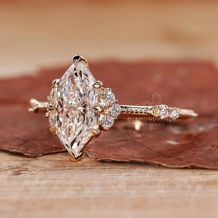 Dutch marquise diamond ring with six claw prong setting.