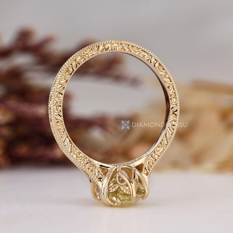 Yellow Dutch marquise ring with hidden leaf basket setting.