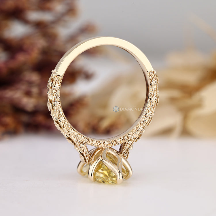 Lab grown diamond engagement ring with flower design.