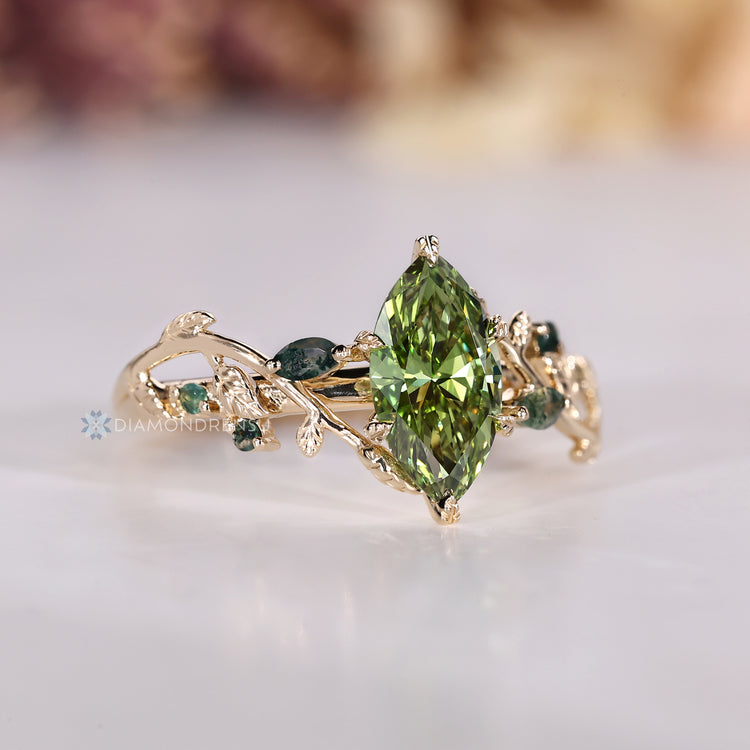Marquise diamond ring with Euro shank and side stones.