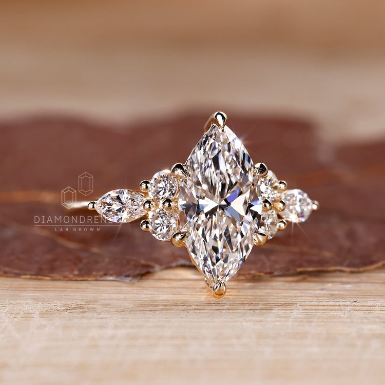 Marquise diamond ring with six claw prong setting.
