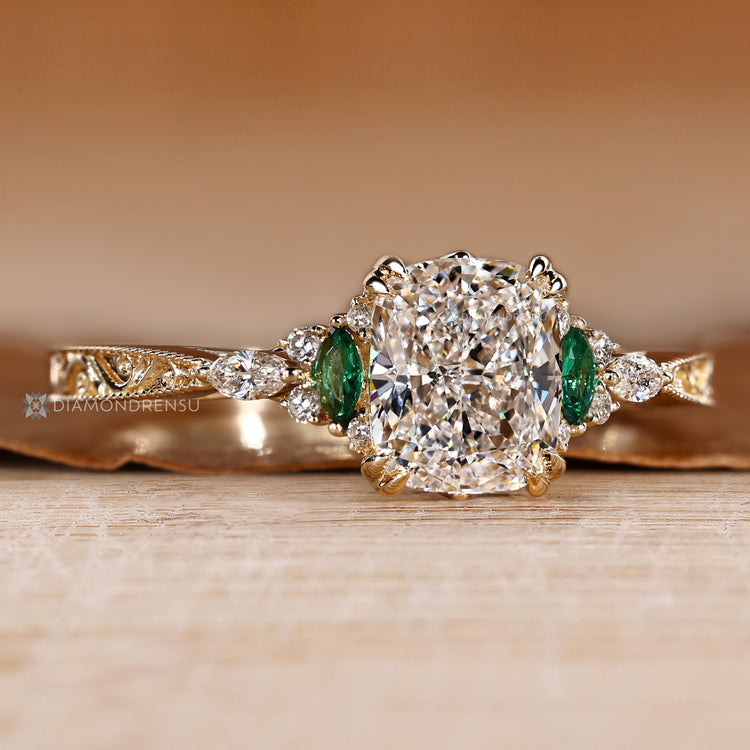 IGI certified cushion cut diamond ring with double claw prongs.