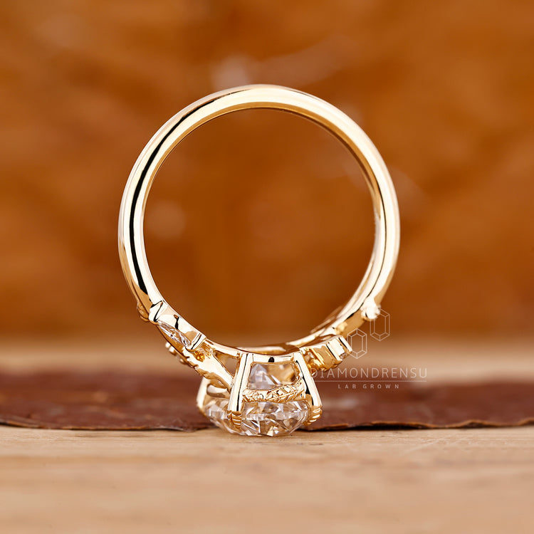 IGI certified oval ring with leaf prong detailing.