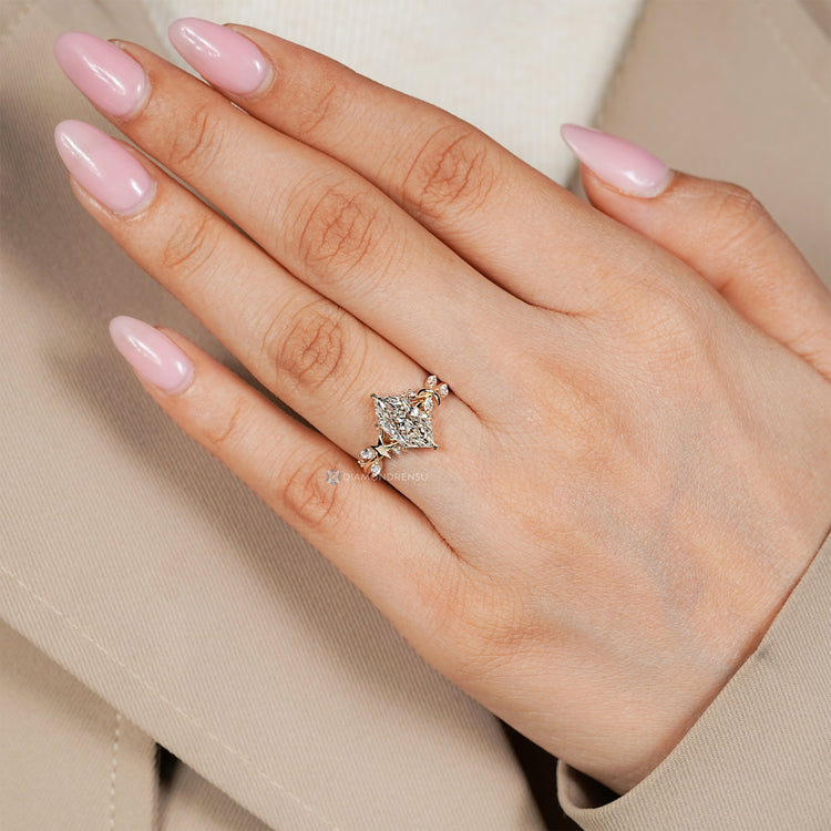 Dutch marquise ring with marquise side stone details.