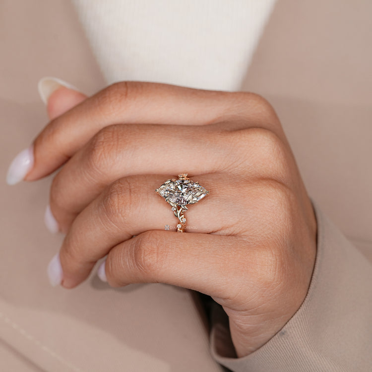 Handmade marquise ring with six leaf style prong setting.