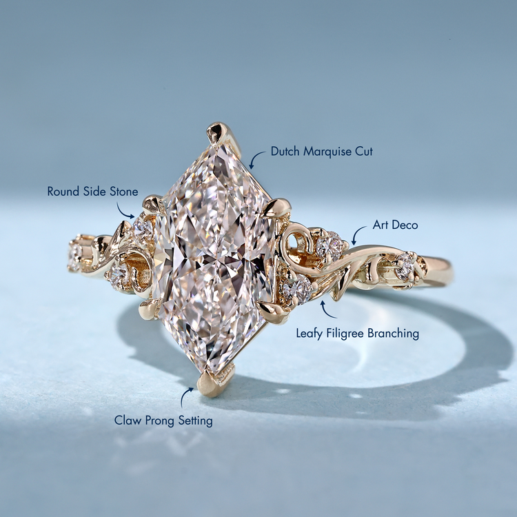 Lab grown Dutch marquise diamond ring with round accents.