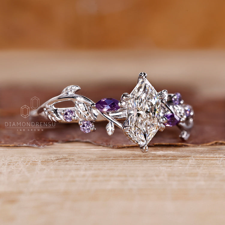 Nature inspired ring with round and marquise tanzanite.