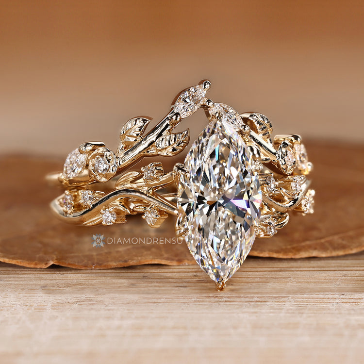 Marquise bridal set with tulip setting and six leaf prongs.