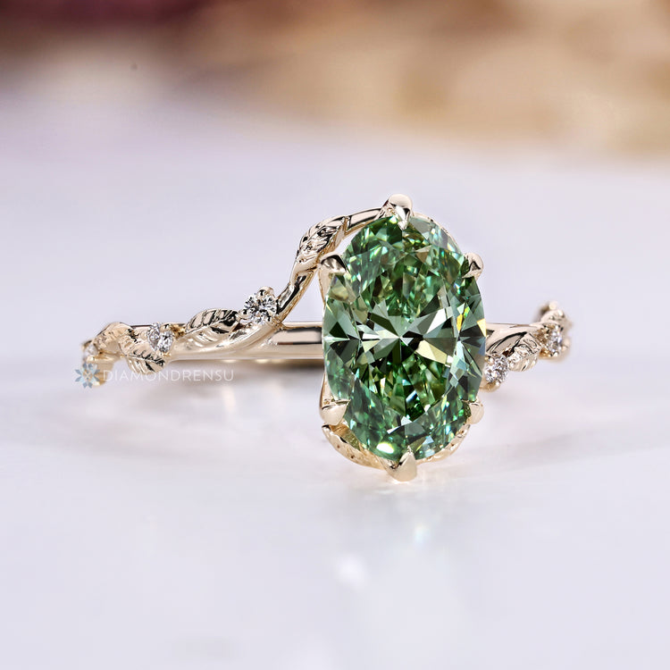 Oval diamond ring with six claw prong setting.