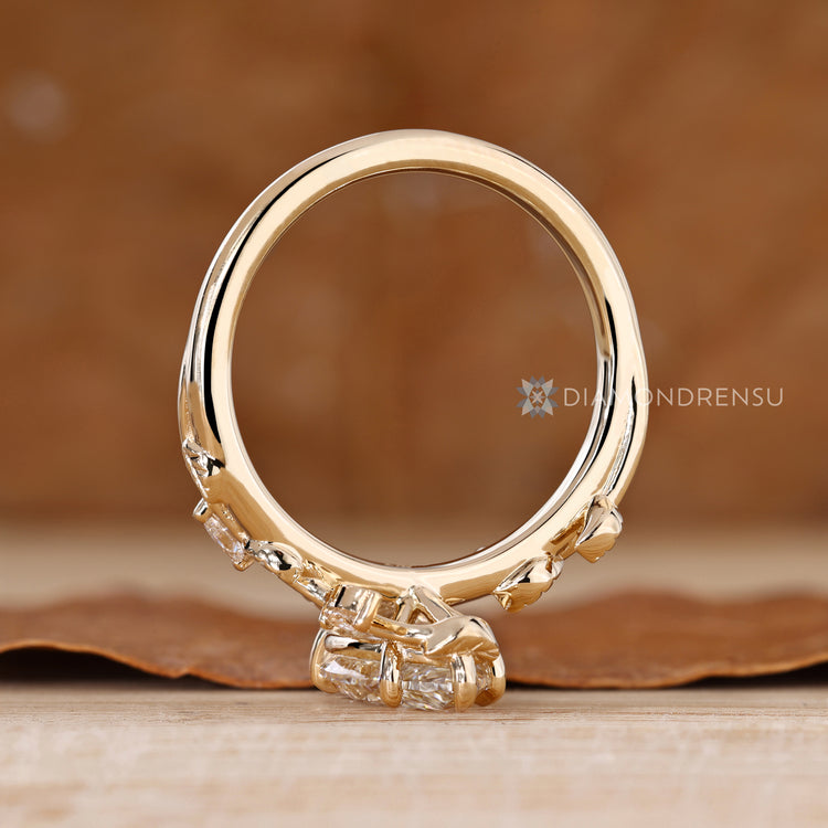 Pear cut diamond ring with secure claw prongs.