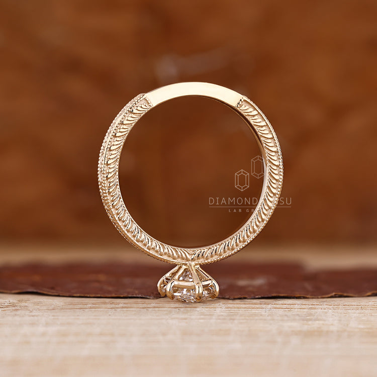Diamondrensu marquise ring with art deco ocean wave design.