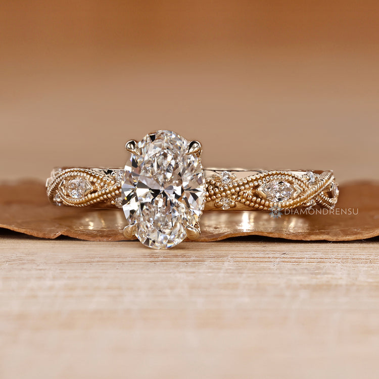 IGI certified oval cut engagement ring with marquise side stones.