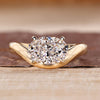 Oval cut diamond ring with east to west setting.