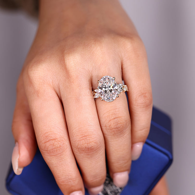 IGI certified oval diamond ring with four claw prongs.
