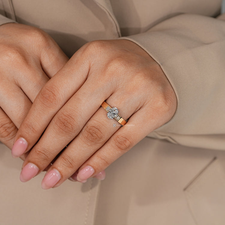 Handmade five stone oval diamond ring with two tone setting.