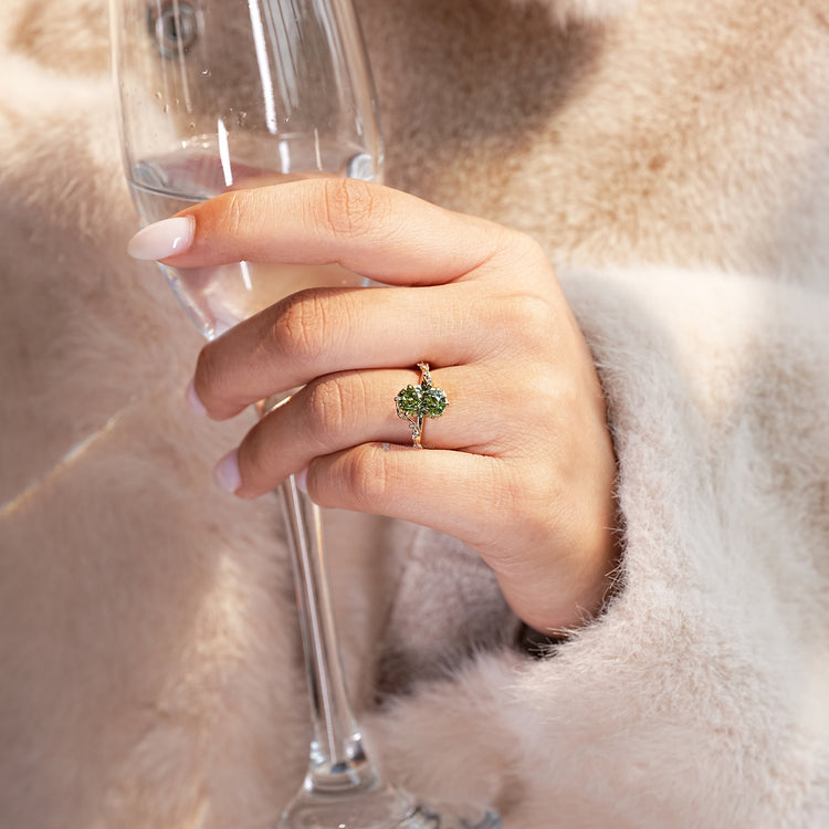 Handmade oval cut ring with tulip setting.