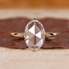 Solitaire engagement ring with oval rose cut diamond.