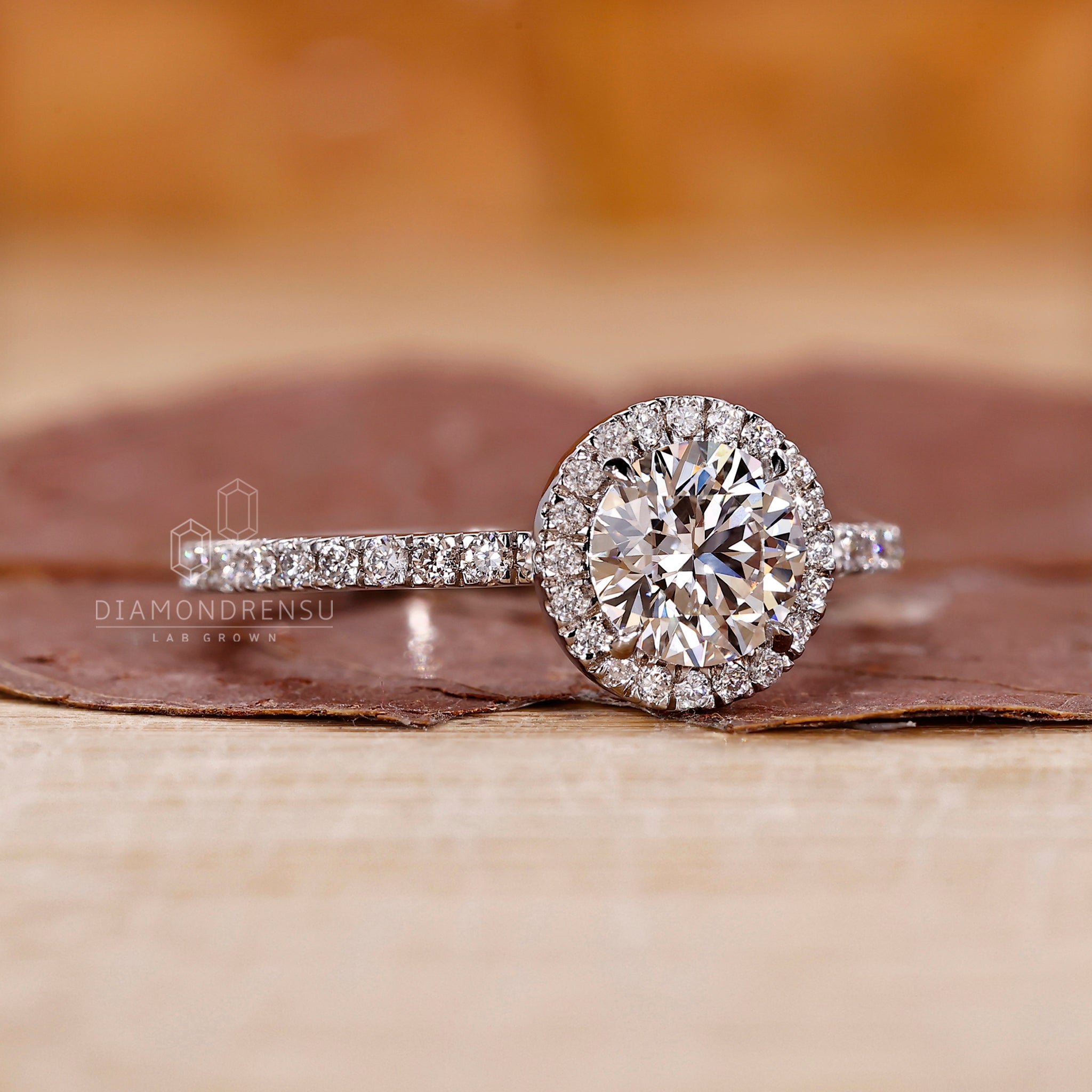 White gold engagement ring with 4 prong setting.
