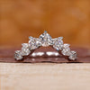 U shaped wedding band crafted in white gold with a clean design.