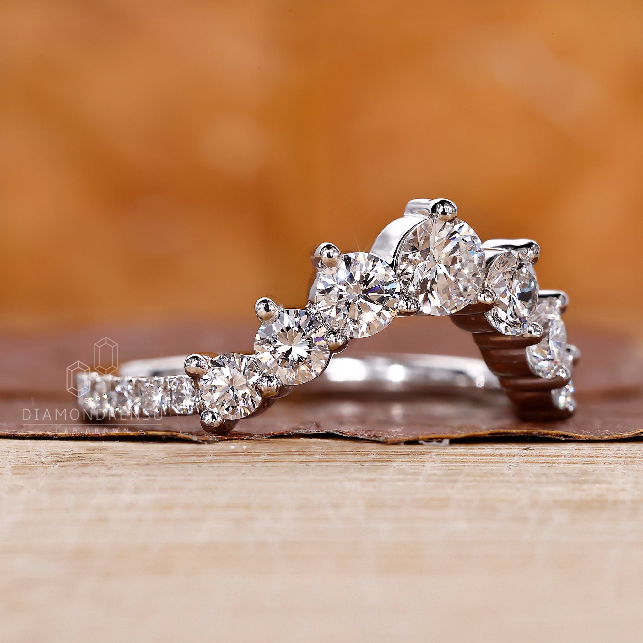 Buy wedding band with lab grown diamonds and sleek prong setting.
