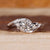 East to west setting ring with marquise diamond.
