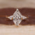 Three stone ring with Dutch Marquise center stone.
