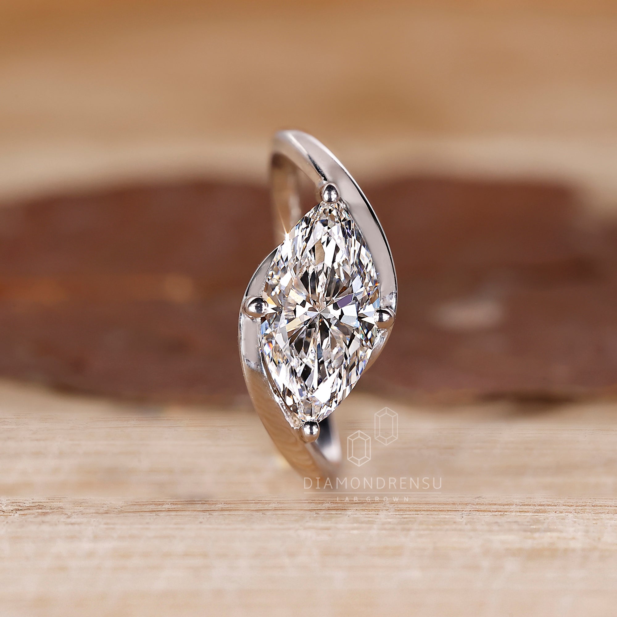 White gold diamond ring with 4 prong setting.
